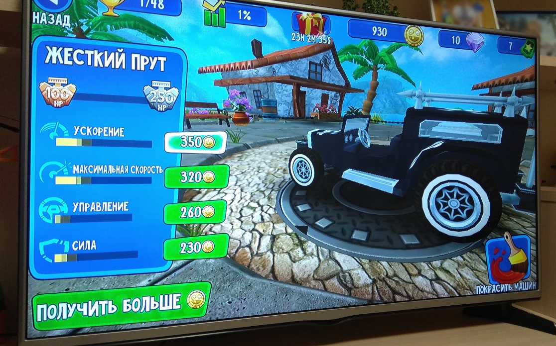 Android TV-приставка с запущенной игрой