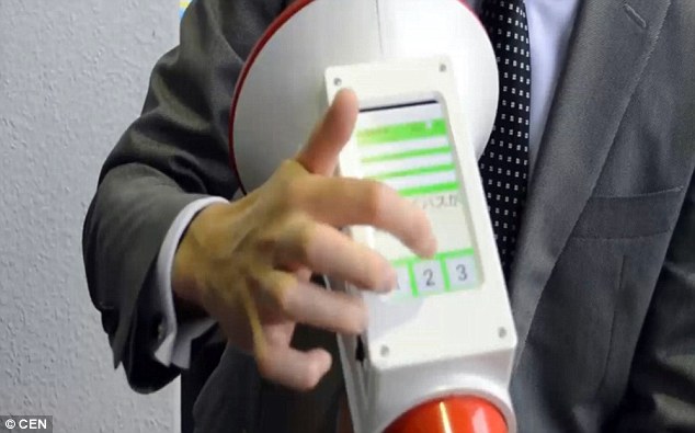 Users of the Megaphoneyaku can select which language they want the megaphone to translate their words into using a touchscreen on top of the device (pictured). For general information announcements they can also ask the device to translate what they say into all three languages